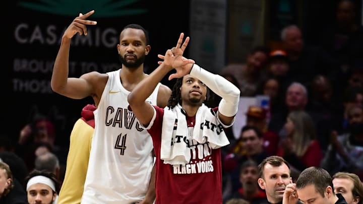 Feb 2, 2025; Cleveland, Ohio, USA; Cleveland Cavaliers forward Evan Mobley (4) and guard Darius Garland (10) celebrate after guard Sam Merrill (not pictured) hit a three point basket during the second half against the Dallas Mavericks at Rocket Mortgage FieldHouse. Mandatory Credit: Ken Blaze-Imagn Images