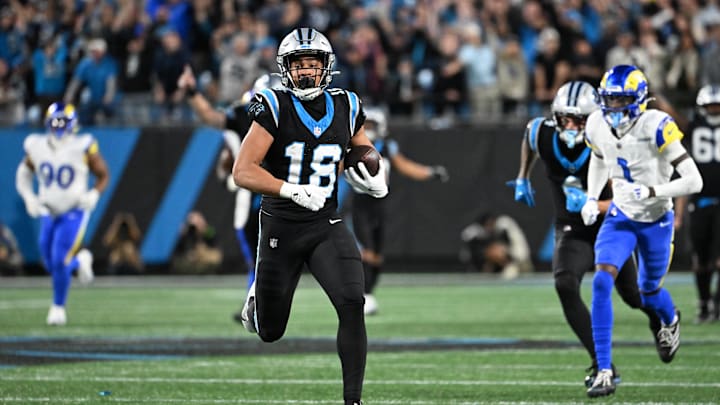 Jan 10, 2026; Charlotte, NC, USA; Carolina Panthers wide receiver Jalen Coker (18) makes a catch against the Los Angeles Rams in the second half during the NFC Wild Card Round game at Bank of America Stadium. Mandatory Credit: Bob Donnan-Imagn Images