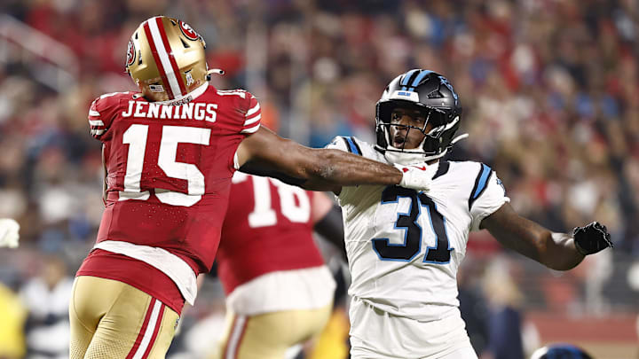 Nov 24, 2025; Santa Clara, California, USA; San Francisco 49ers wide receiver Jauan Jennings (15) and Carolina Panthers cornerback Corey Thornton (31) shove each other during the second half at Levi's Stadium. Mandatory Credit: Kelley L Cox-Imagn Images