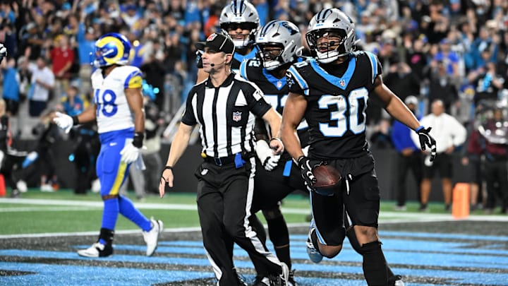 Jan 10, 2026; Charlotte, NC, USA; Carolina Panthers running back Chuba Hubbard (30) reacts after scoring a touchdown against the Los Angeles Rams in the second half during the NFC Wild Card Round game at Bank of America Stadium. Mandatory Credit: Bob Donnan-Imagn Images