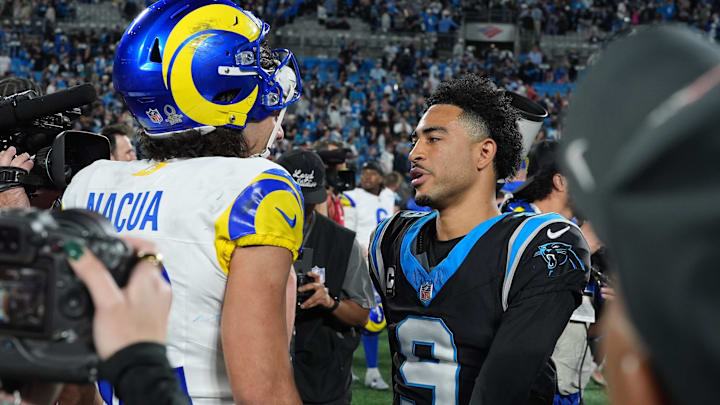 Los Angeles Rams wide receiver Puka Nacua (12) and Carolina Panthers quarterback Bryce Young (9) react Los Angeles Rams wide receiver Puka Nacua (12) and Carolina Panthers quarterback Bryce Young (9) react