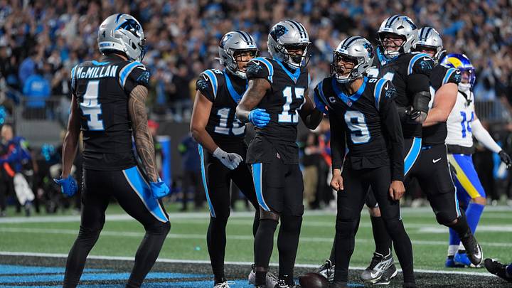 Carolina Panthers quarterback Bryce Young (9) reacts after scoring a touchdown