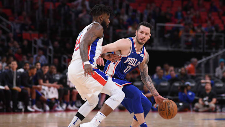 Apr 4, 2018; Detroit, MI, USA; Philadelphia 76ers guard JJ Redick (17) drives to the basket as Detroit Pistons guard Reggie Bullock (25) defends during the fourth quarter at Little Caesars Arena. Mandatory Credit: Tim Fuller-USA TODAY Sports