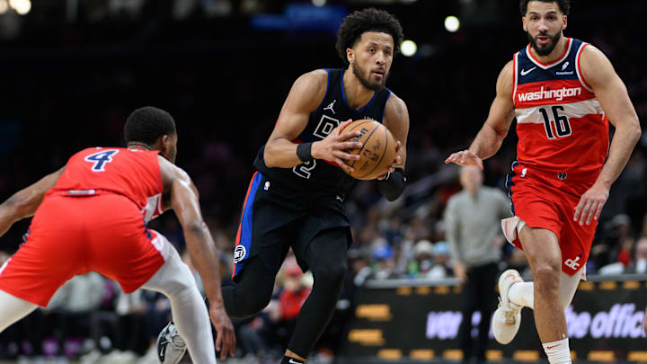 Mar 29, 2024; Washington, District of Columbia, USA; Detroit Pistons guard Cade Cunningham (2) prepares to dribble against Washington Wizards forward Anthony Gill (16) during the third quarter at Capital One Arena. Mandatory Credit: Reggie Hildred-Imagn Images