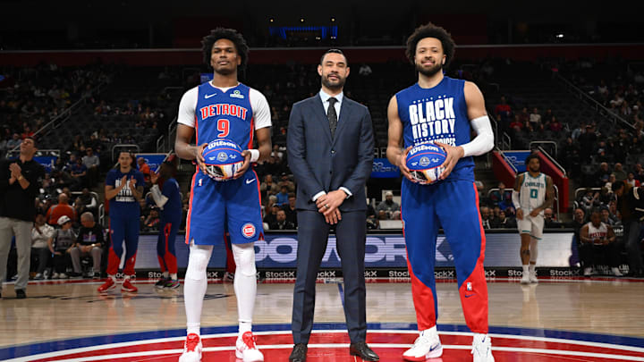 Feb 9, 2025; Detroit, Michigan, USA; Detroit Pistons forward Ausar Thompson (9) and Detroit Pistons guard Cade Cunningham (2) stand at center court with Detroit Pistons President of Basketball Operations Trajan Langdon to be recognized for being named to the NBA All-Star Team before their game against the Charlotte Hornets at Little Caesars Arena. Mandatory Credit: Lon Horwedel-Imagn Images