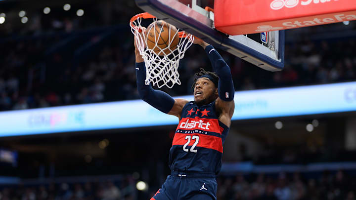 Feb 10, 2025; Washington, District of Columbia, USA;  Washington Wizards forward Richaun Holmes (22) dunks the ball during the first quarter against the San Antonio Spursat Capital One Arena. Mandatory Credit: Reggie Hildred-Imagn Images