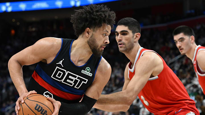 Apr 5, 2025; Detroit, Michigan, USA; Detroit Pistons guard Cade Cunningham (2) looks to drive past Memphis Grizzlies forward Santi Aldama (7) in the first quarter at Little Caesars Arena. Mandatory Credit: Lon Horwedel-Imagn Images Apr 5, 2025; Detroit, Michigan, USA; Detroit Pistons guard Cade Cunningham (2) looks to drive past Memphis Grizzlies forward Santi Aldama (7) in the first quarter at Little Caesars Arena. Mandatory Credit: Lon Horwedel-Imagn Images