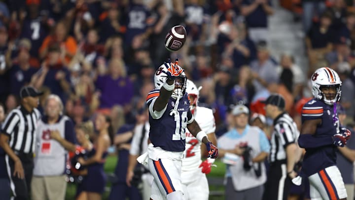 Sep 14, 2024; Auburn, Alabama, USA; Auburn Tigers wide receiver Sam Jackson V (18) tosses the ball to a game official during the game against the New Mexico Lobos at Jordan-Hare Stadium. Mandatory Credit: John Reed-Imagn Images Sep 14, 2024; Auburn, Alabama, USA; Auburn Tigers wide receiver Sam Jackson V (18) tosses the ball to a game official during the game against the New Mexico Lobos at Jordan-Hare Stadium. Mandatory Credit: John Reed-Imagn Images