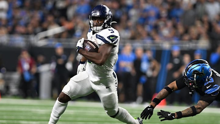 Sep 30, 2024; Detroit, Michigan, USA;  Seattle Seahawks running back Kenneth Walker III (9) runs the ball against the Detroit Lions in the fourth quarter at Ford Field. Mandatory Credit: Lon Horwedel-Imagn Images