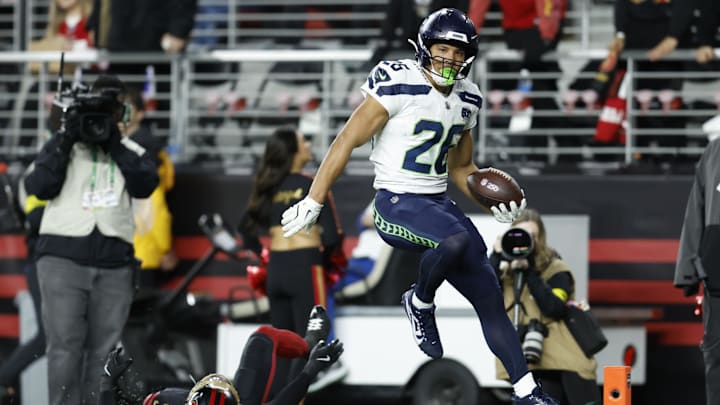 Jan 3, 2026; Santa Clara, California, USA;Seattle Seahawks running back Zach Charbonnet (26) rushes for a touchdown against the San Francisco 49ers during the first half at Levi's Stadium. Mandatory Credit: Sergio Estrada-Imagn Images Jan 3, 2026; Santa Clara, California, USA;Seattle Seahawks running back Zach Charbonnet (26) rushes for a touchdown against the San Francisco 49ers during the first half at Levi's Stadium. Mandatory Credit: Sergio Estrada-Imagn Images