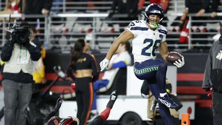 Jan 3, 2026; Santa Clara, California, USA;Seattle Seahawks running back Zach Charbonnet (26) rushes for a touchdown against the San Francisco 49ers during the first half at Levi's Stadium. Mandatory Credit: Sergio Estrada-Imagn Images