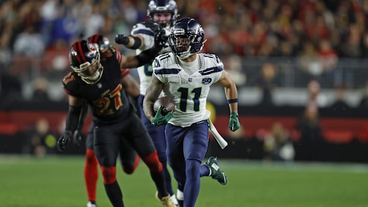 Jan 3, 2026; Santa Clara, California, USA; Seattle Seahawks wide receiver Jaxon Smith-Njigba (11) runs after a catch against the San Francisco 49ers during the first half at Levi's Stadium. Mandatory Credit: Sergio Estrada-Imagn Images
