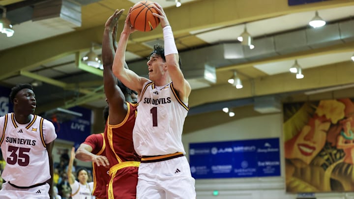 Nov 26, 2025; Lahaina, HI, USA; Arizona State Sun Devils forward Santiago Trouet (1) goes for the net over the USC Trojans during the first half of the championship match at Lahaina Civic Center. Mandatory Credit: Marco Garcia-Imagn Images