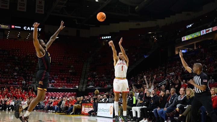 Jan 13, 2025; College Park, Maryland, USA; Maryland Terrapins guard Rodney Rice (1) takes a three point shot over Minnesota Golden Gophers guard Femi Odukale (11) during the second half at Xfinity Center. Mandatory Credit: Reggie Hildred-Imagn Images