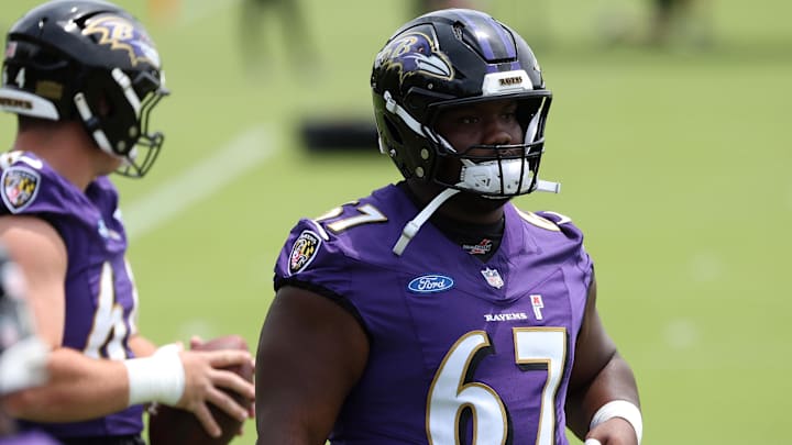 Jun 10, 2025; Baltimore, MD, USA; Baltimore Ravens offensive tackle Corey Bullock (67) looks on during an NFL OTA at Under Armour Performance Center. Mandatory Credit: Daniel Kucin Jr.-Imagn Images