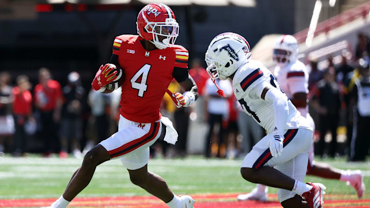Aug 30, 2025; College Park, Maryland, USA; Maryland Terrapins wide receiver Shaleak Knotts (4) runs past by Florida Atlantic Owls defensive back Terez Reid (27) during the first half at SECU Stadium. Mandatory Credit: Daniel Kucin Jr.-Imagn Images