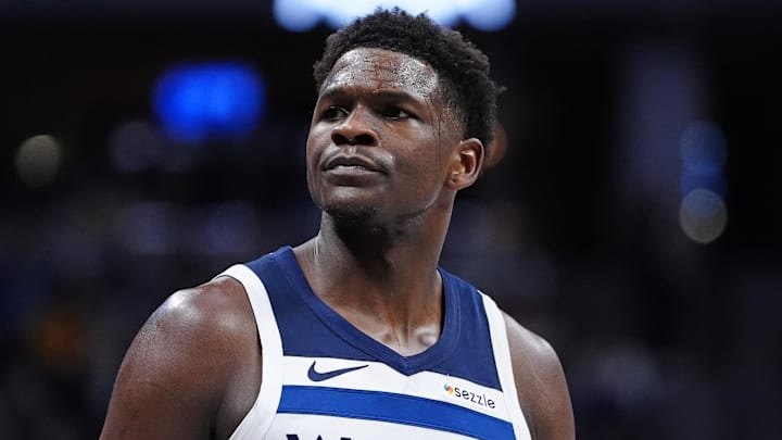 Dec 25, 2025; Denver, Colorado, USA; Minnesota Timberwolves guard Anthony Edwards (5) reacts against the Denver Nuggets during the first half at Ball Arena. Mandatory Credit: Ron Chenoy-Imagn Images
