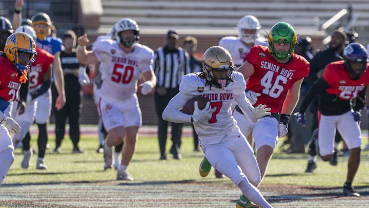 Jan 28, 2026; Mobile, AL, USA; National Team wide receiver Tyren Montgomery (7) of John Carroll runs after a catch during National Senior Bowl practice at Hancock Whitney Stadium. Mandatory Credit: Vasha Hunt-Imagn Images