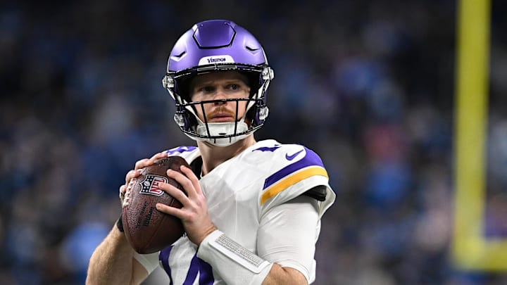 Jan 5, 2025; Detroit, Michigan, USA;  Minnesota Vikings quarterback Sam Darnold (14) throws passes during pregame warmups before their game against the Detroit Lions at Ford Field. Mandatory Credit: Lon Horwedel-Imagn Images