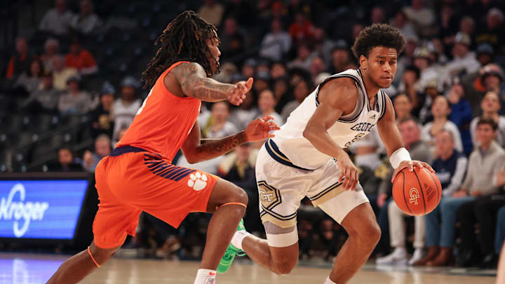 Jan 14, 2025; Atlanta, Georgia, USA; Georgia Tech guard Jaeden Mustaf (3) drives the ball to the basket against Clemson Tigers guard Del Jones (10) during the first half at McCamish Pavilion. Mandatory Credit: Jordan Godfree-Imagn Images