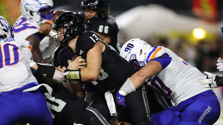 Oct 12, 2024; Honolulu, Hawaii, USA; Boise State Broncos defensive tackle Braxton Fely (90) sacks Hawaii Rainbow Warriors quarterback Brayden Schager (13) during the second quarter at Clarence T.C. Ching Athletics Complex. Mandatory Credit: Marco Garcia-Imagn Images Oct 12, 2024; Honolulu, Hawaii, USA; Boise State Broncos defensive tackle Braxton Fely (90) sacks Hawaii Rainbow Warriors quarterback Brayden Schager (13) during the second quarter at Clarence T.C. Ching Athletics Complex. Mandatory Credit: Marco Garcia-Imagn Images