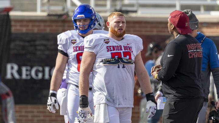Jan 29, 2026; Mobile, AL, USA; National offensive lineman Keylan Rutledge (77) of Georgia Tech takes a breather during National Senior Bowl practice at Hancock Whitney Stadium. Mandatory Credit: Vasha Hunt-Imagn Images