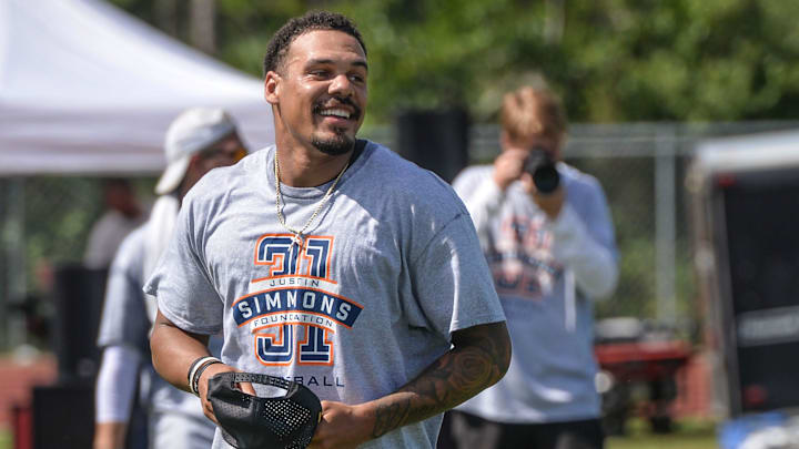 Former NFL Denver Broncos Safety Justin Simmons holds the Justin Simmons Free Florida Youth Football Camp on Saturday, July 13, 2024, at South Fork High School in Stuart. More than 200 children ages 6 through 17 from around the Treasure Coast participated in the action-filled camp, along with several NFL Football members and local coaches, ending with autograph and photo session. | ERIC HASERT/TCPALM / USA TODAY NETWORK