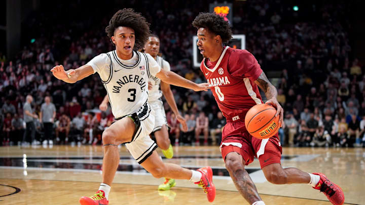 Alabama guard Labaron Philon (0) pushes up the court past Vanderbilt guard Tyler Tanner (3) during the first half at Memorial Gymnasium in Nashville, Tenn., Wednesday, Jan. 7, 2026.