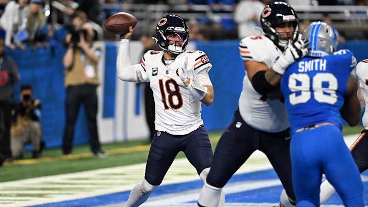 Chicago Bears quarterback Caleb Williams (18) throws a pass out of his own end zone against the Detroit Lions Chicago Bears quarterback Caleb Williams (18) throws a pass out of his own end zone against the Detroit Lions