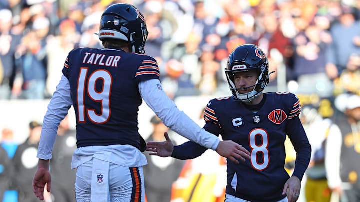 Nov 23, 2025; Chicago, Illinois, USA; Chicago Bears place kicker Cairo Santos (8) reacts with punter Tory Taylor (19) after a PAT during the second half at Soldier Field. Mandatory Credit: Mike Dinovo-Imagn Images Nov 23, 2025; Chicago, Illinois, USA; Chicago Bears place kicker Cairo Santos (8) reacts with punter Tory Taylor (19) after a PAT during the second half at Soldier Field. Mandatory Credit: Mike Dinovo-Imagn Images