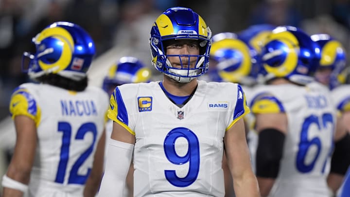 Jan 10, 2026; Charlotte, NC, USA; Los Angeles Rams quarterback Matthew Stafford (9) reacts in the first half during the NFC Wild Card Round game at Bank of America Stadium. Mandatory Credit: Jim Dedmon-Imagn Images
