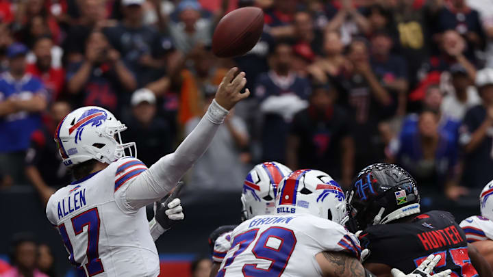 Oct 6, 2024; Houston, Texas, USA; Buffalo Bills quarterback Josh Allen (17) passes deep in the end zone against the Houston Texans in the fourth quarter at NRG Stadium. Mandatory Credit: Thomas Shea-Imagn Images