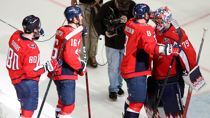 Mar 20, 2025; Washington, District of Columbia, USA; Washington Capitals goaltender Charlie Lindgren (79) celebrates with his teammates after a game against the Philadelphia Flyers at Capital One Arena. Mandatory Credit: Daniel Kucin Jr.-Imagn Images