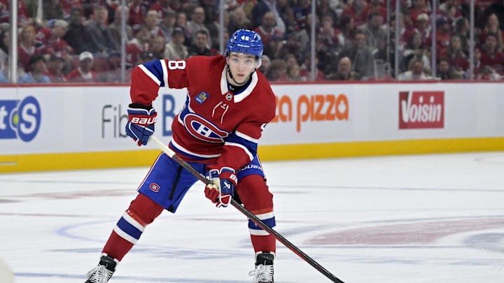 Apr 25, 2025; Montreal, Quebec, CAN; Montreal Canadiens defenseman Lane Hutson (48) plays the puck against the Washington Capitals during the second period in game three of the first round of the 2025 Stanley Cup Playoffs at the Bell Centre. Mandatory Credit: Eric Bolte-Imagn Images