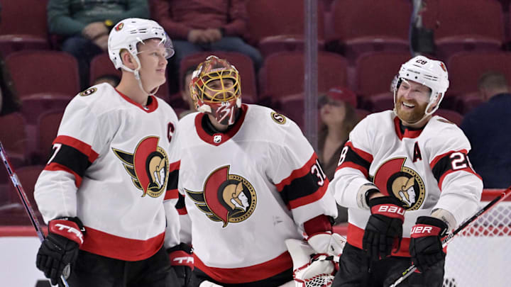 Oct 4, 2022; Montreal, Quebec, CAN; Ottawa Senators forward Brady Tkachuk (7) and teammates goalie Anton Forsberg (31) and forward Claude Giroux (28) celebrate the win against the Montreal Canadiens at the Bell Centre. Mandatory Credit: Eric Bolte-Imagn Images