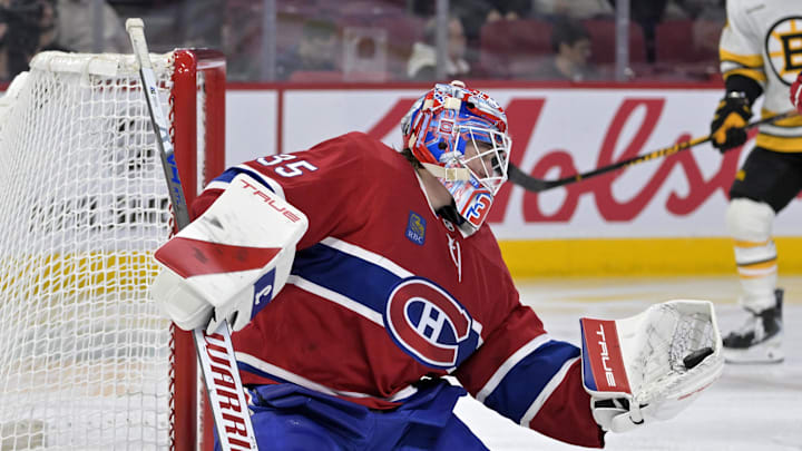 Nov 15, 2025; Montreal, Quebec, CAN; Montreal Canadiens goalie Sam Montembeault (35) makes a glove save against the Boston Bruins during the third period at the Bell Centre. Mandatory Credit: Eric Bolte-Imagn Images