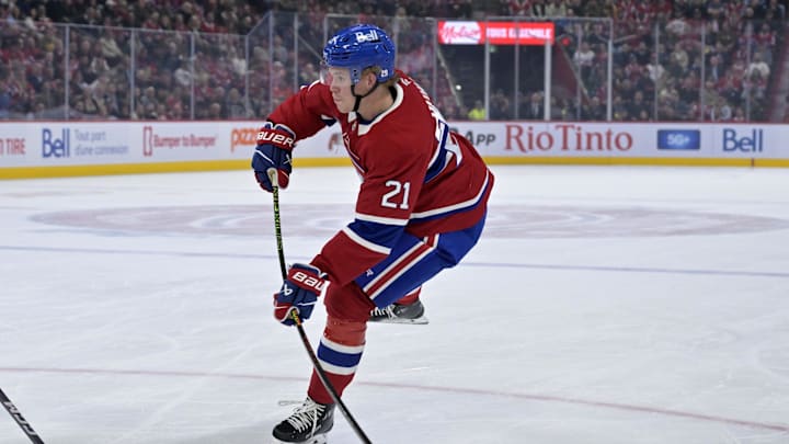 Oct 14, 2025; Montreal, Quebec, CAN; Montreal Canadiens defenseman Kaiden Guhle (21) takes a shot on net during the second period of the game against the Seattle Kraken at the Bell Centre. Mandatory Credit: Eric Bolte-Imagn Images