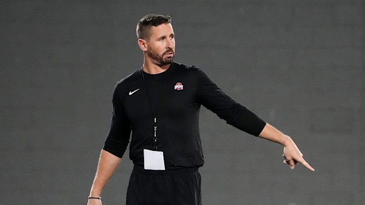 Mar 7, 2023; Columbus, Ohio, USA;  Ohio State Buckeyes offensive coordinator Brian Hartline motions during spring football drills at the Woody Hayes Athletic Center. Mandatory Credit: Adam Cairns-The Columbus Dispatch

Football Ohio State Buckeyes Football