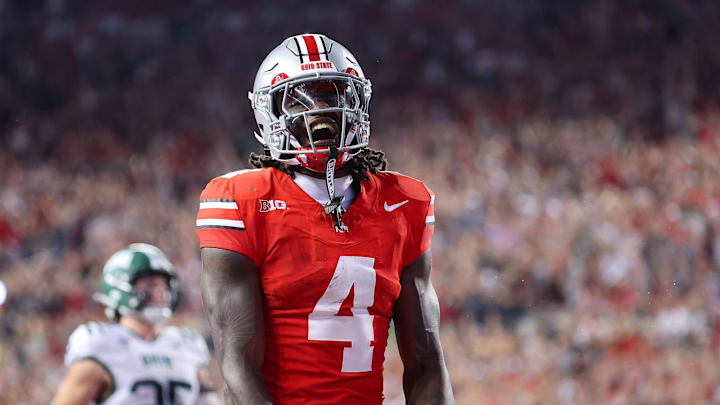 Sep 13, 2025; Columbus, Ohio, USA; Ohio State Buckeyes wide receiver Jeremiah Smith (4) celebrates his touchdown during the second half against the Ohio Bobcats at Ohio Stadium. Mandatory Credit: Joseph Maiorana-Imagn Images Sep 13, 2025; Columbus, Ohio, USA; Ohio State Buckeyes wide receiver Jeremiah Smith (4) celebrates his touchdown during the second half against the Ohio Bobcats at Ohio Stadium. Mandatory Credit: Joseph Maiorana-Imagn Images