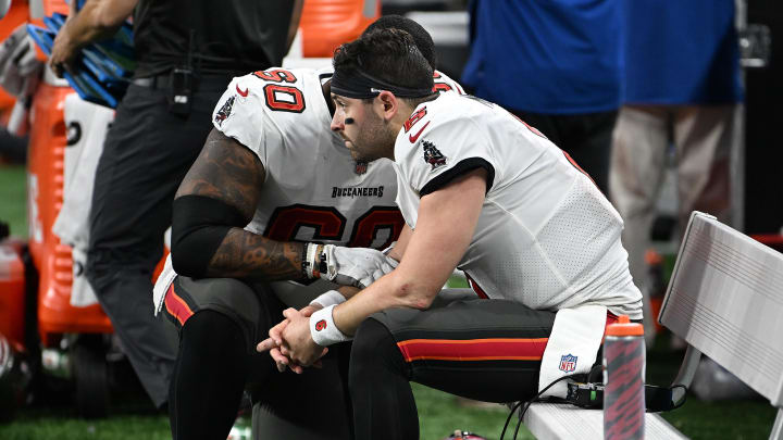 Jan 21, 2024; Detroit, Michigan, USA; Tampa Bay Buccaneers guard Nick Leverett (60) and quarterback Baker Mayfield (6) react after losing a 2024 NFC divisional round game against the Detroit Lions at Ford Field. Mandatory Credit: Lon Horwedel-USA TODAY Sports
