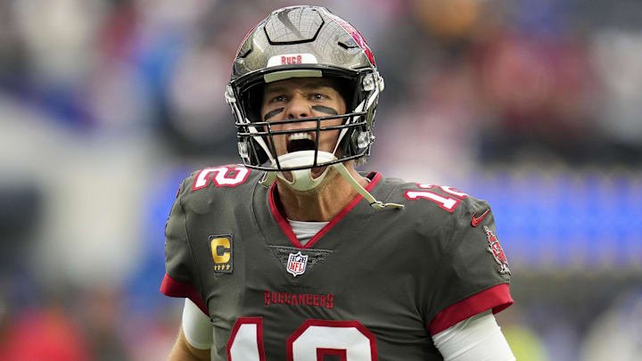 Tampa Bay Buccaneers quarterback Tom Brady yells at Bucs fans as he takes the field for pregame warmups.