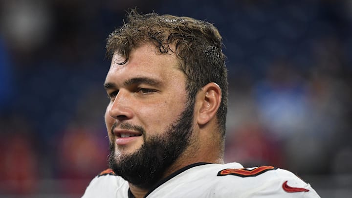 Tampa Bay Buccaneers guard Ben Bredeson (68) talks with teammates after their game against the Detroit Lions Tampa Bay Buccaneers guard Ben Bredeson (68) talks with teammates after their game against the Detroit Lions