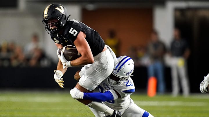 Vanderbilt wide receiver Richie Hoskins (5) is stopped by Georgia State safety Jaylen Jones (23) during the first quarter at FirstBank Stadium in Nashville, Tenn., Saturday, Sept. 20, 2025.