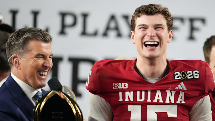 Indiana Hoosiers quarterback Fernando Mendoza (15) reacts on stage after defeating the Miami Hurricanes in the College Football Playoff National Championship.