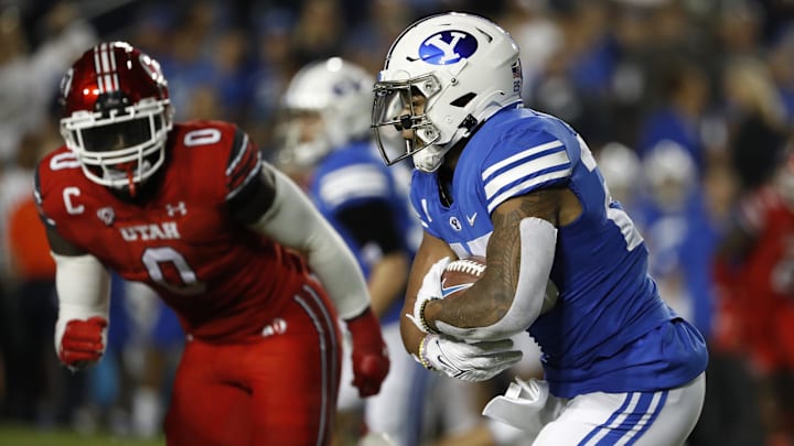 Sep 11, 2021; Provo, Utah, USA; Brigham Young Cougars running back Tyler Allgeier (25) runs the ball in the first quarter against the Utah Utes at LaVell Edwards Stadium. Mandatory Credit: Jeffrey Swinger-Imagn Images Sep 11, 2021; Provo, Utah, USA; Brigham Young Cougars running back Tyler Allgeier (25) runs the ball in the first quarter against the Utah Utes at LaVell Edwards Stadium. Mandatory Credit: Jeffrey Swinger-Imagn Images