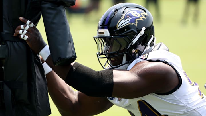 Baltimore Ravens defensive end Adedayo Odeleye performs a drill during an NFL OTA at Under Armour Performance Center.