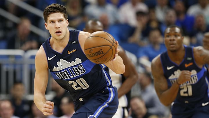 Apr 4, 2018; Orlando, FL, USA; Dallas Mavericks forward Doug McDermott (20) drives to the basket against the Orlando Magic during the first quarter at Amway Center. Mandatory Credit: Kim Klement-Imagn Images