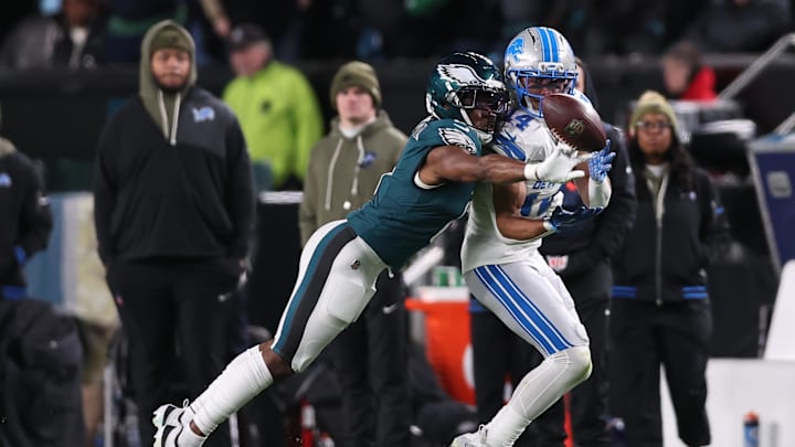 Nov 16, 2025; Philadelphia, Pennsylvania, USA; Philadelphia Eagles cornerback Adoree' Jackson (8) breaks up a pass on Detroit Lions wide receiver Amon-Ra St. Brown (14) during the second half at Lincoln Financial Field. Mandatory Credit: Bill Streicher-Imagn Images