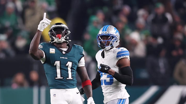 Nov 16, 2025; Philadelphia, Pennsylvania, USA; Philadelphia Eagles wide receiver A.J. Brown (11) reacts after making a catch against Detroit Lions cornerback Rock Ya-Sin (23)  during the first half at Lincoln Financial Field. 