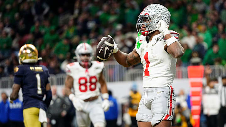Ohio State Buckeyes running back Quinshon Judkins (1) celebrates a touchdown catch against Notre Dame Fighting Irish in the second quarter during the College Football Playoff National Championship at Mercedes-Benz Stadium in Atlanta on January 20, 2025.